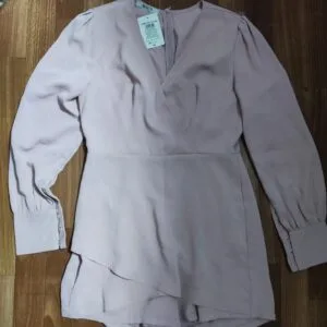 Hermoso Enterizo Corto con manga larga🤗.👍